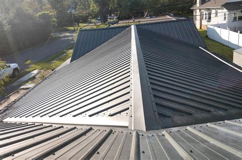 top of a house roof metal chanel|metal roofing video.